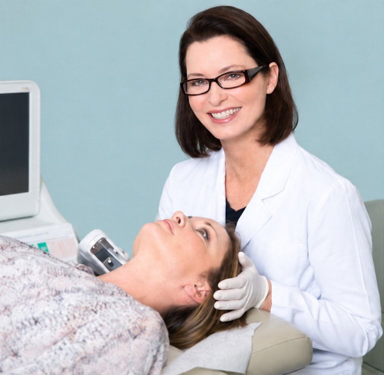 Dr. Sikorski with a patient in a treatment setting